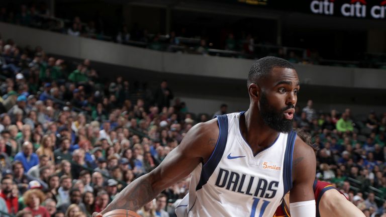 Tim Hardaway Jr. #11 of the Dallas Mavericks handles the ball against the Cleveland Cavaliers on March 16, 2019 at the American Airlines Center in Dallas, Texas.