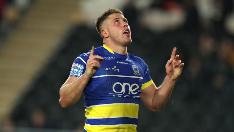 Tom Lineham celebrates his second try after intercepting a pass to run the field