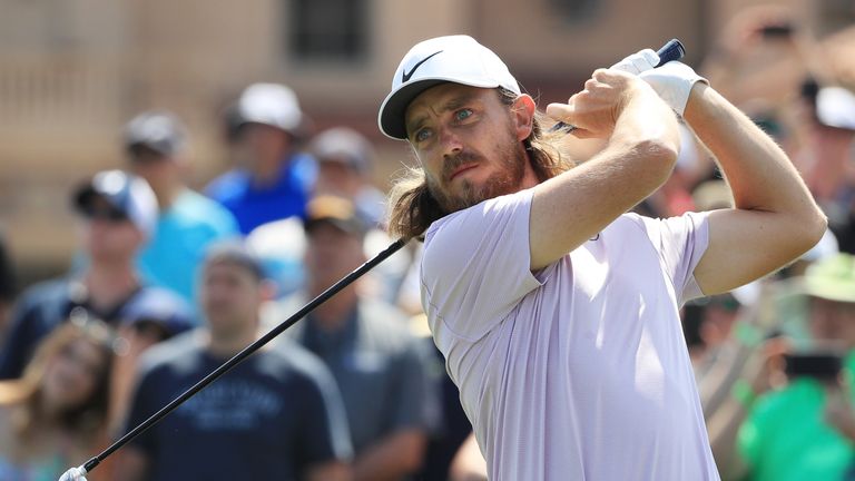 Tommy Fleetwood hits his tee shot at the first during his second round