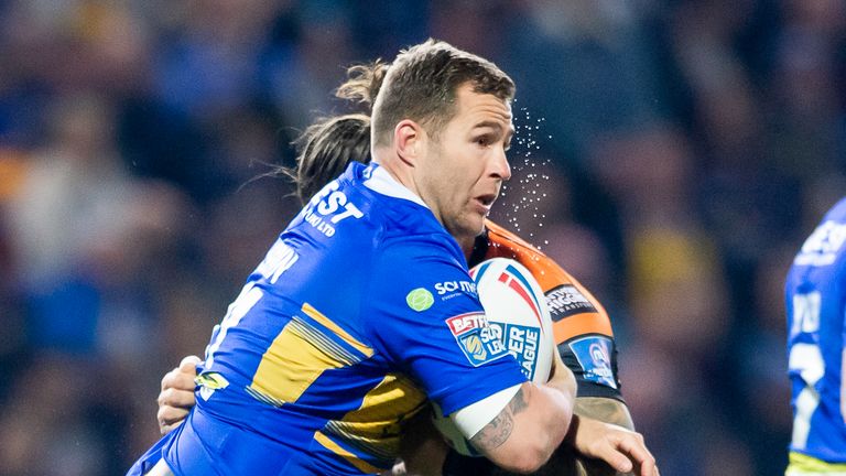 Leeds's Trent Merrin is tackled by Castleford's Alex Foster