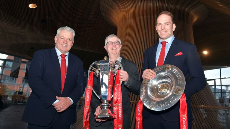 (From left to right) Wales head coach Warren Gatland, First Minister of Wales Mark Drakeford and captain Alun Wyn Jones pose for a photo with the Six Nations trophy and Triple Crown trophy during the 2019 Guinness Six Nations Grand Slam winners celebration welcome at the Senedd in Cardiff Bay.