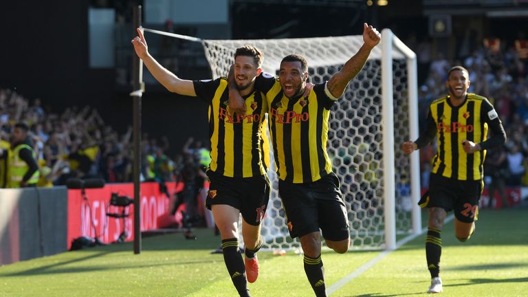 Troy Deeney and Craig Cathcart celebrate during the Premier League match between Watford FC and Tottenham Hotspur at Vicarage Road on September 2, 2018 in Watford, United Kingdom.