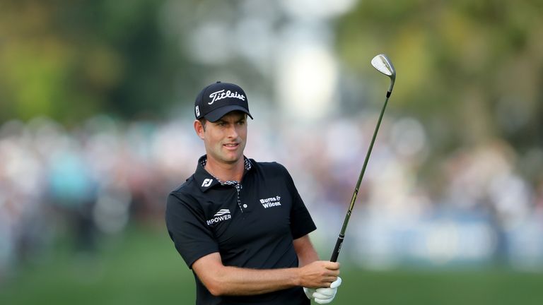 Webb Simpson was penalised for moving his ball on the 14th at Sawgrass