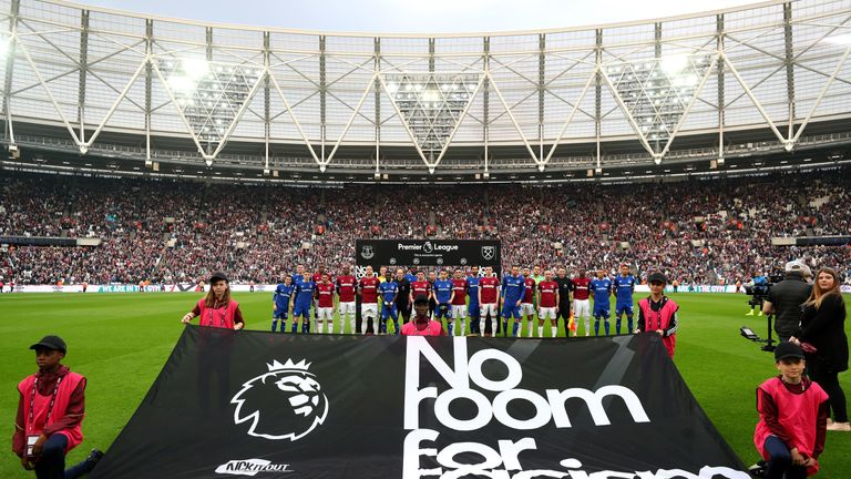 West Ham and Everton players stand with match officials in support of the Premier League&#39;s &#39;No Room For Racism&#39; campaign