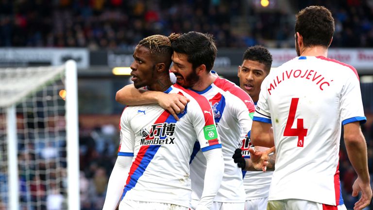 Wilfried Zaha of Crystal Palace celebrates after scoring his team's third goal
