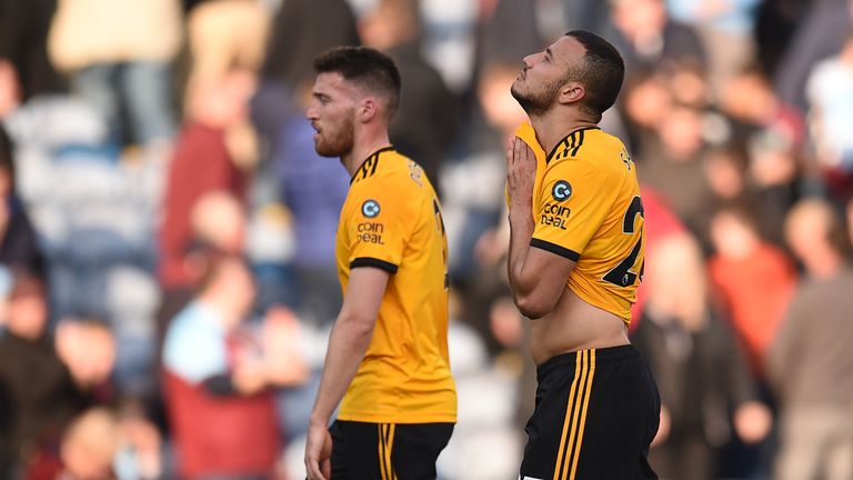 Wolves players look dejected following their defeat to Burnley in the Premier League.