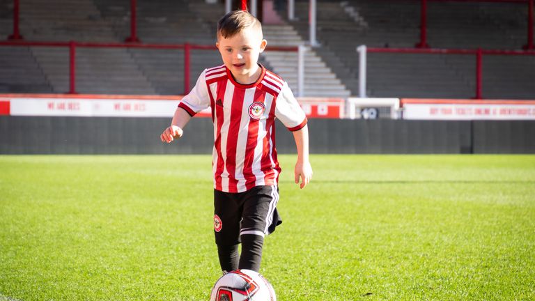Woody has been welcomed with "open arms" by Brentford, according to the youngster's mother.