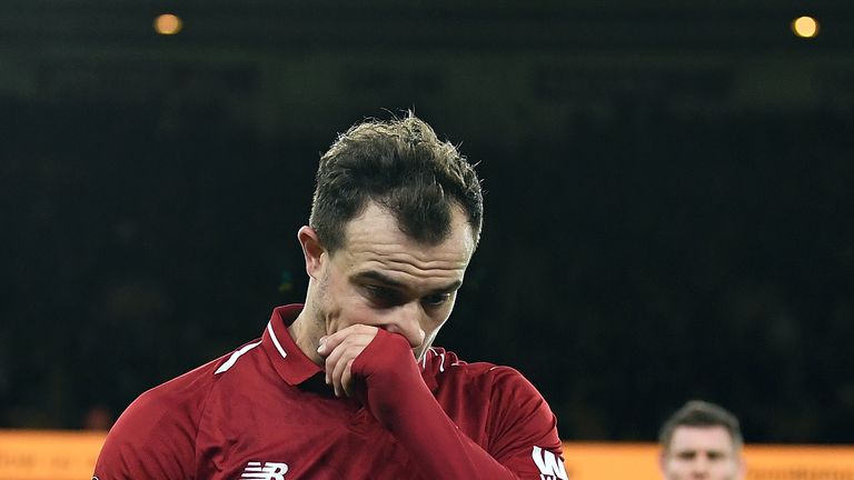 Xherdan Shaqiri looks dejected after Liverpool are eliminated from the FA Cup by Wolves