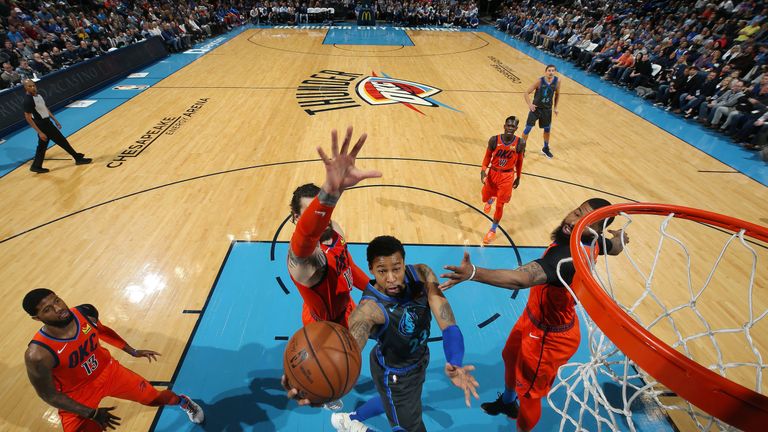 Trey Burke drives to the rim against the Oklahoma City Thunder