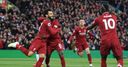 Liverpool hit five to return top