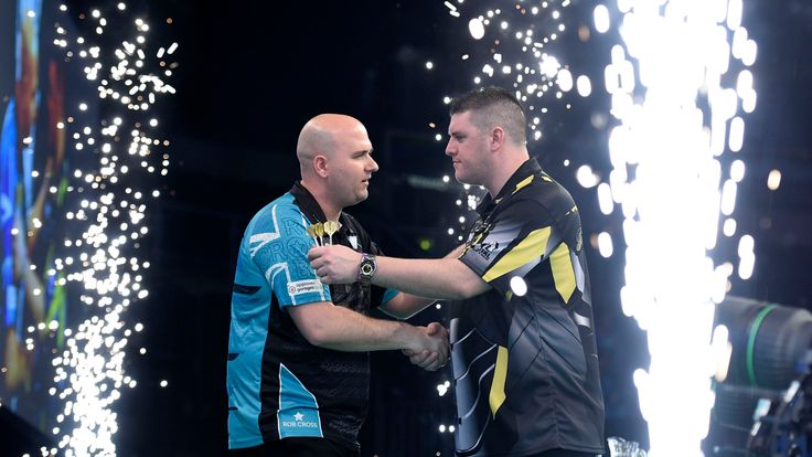 4/4/19: Rob Cross with Daryl Gurney during the Unibet Premier League Darts at the SSE Arena, Belfast. Picture: Michael Cooper