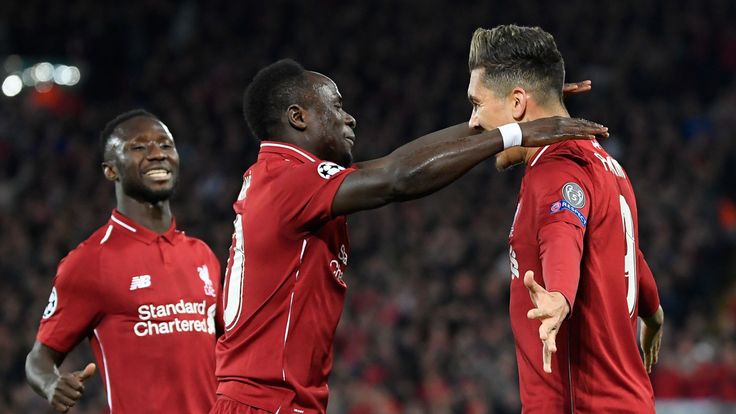 Roberto Firmino celebrates with Sadio Mane after scoring for Liverpool against Porto