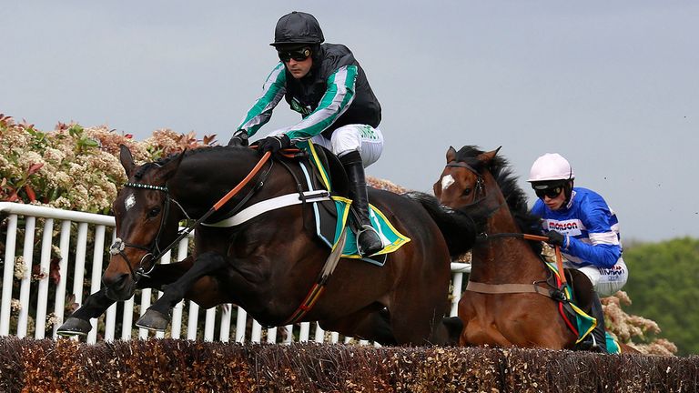 Altior and Nico de Boinville clear an early fence before winning The bet365 Celebration Chase Race run at Sandown Park Racecourse, Esher. PRESS ASSOCIATION Photo. Picture date: Saturday April 27, 2019. See PA story RACING Sandown. Photo credit should read: Julian Herbert/PA Wire