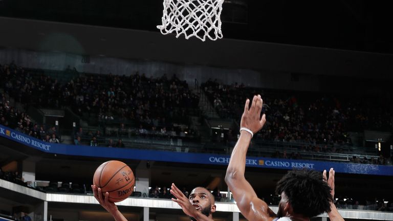 Chris Paul rises to the rim against the Sacramento Kings