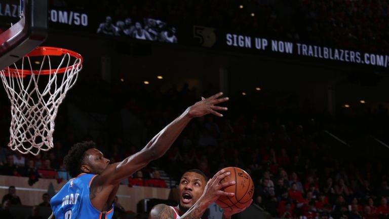 Damian Lillard rises to the rim to score against the Oklahoma City Thunder