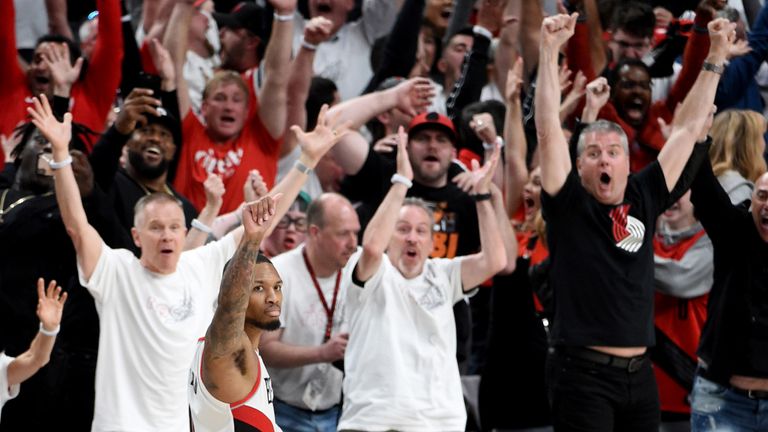 Damian Lillard celebrates after his buzzer-beating three-pointer sealed a 4-1 series win for Portland