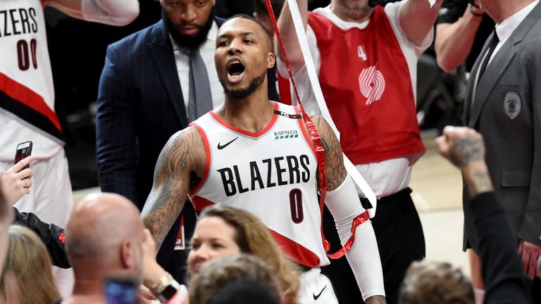 Damian Lillard roars to the Portland fans after his buzzer-beater earned Portland a 4-1 series win over the Thunder