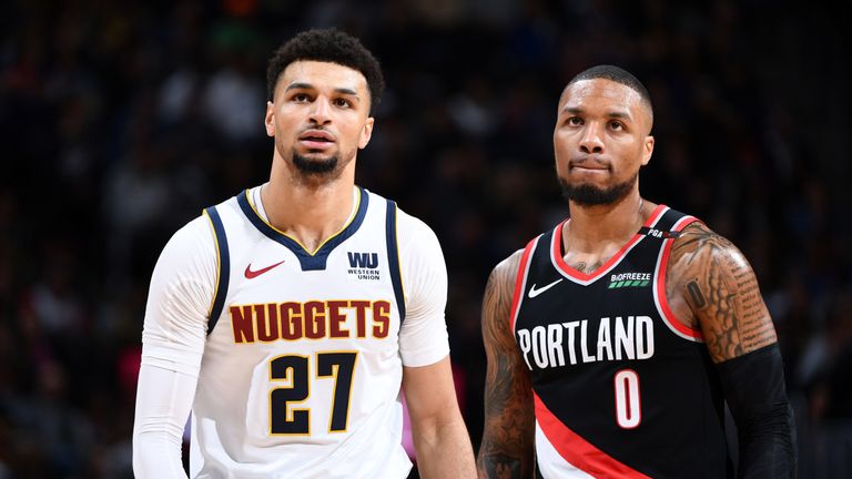 Jamal Murray and Damian Lillard in action in Game  1