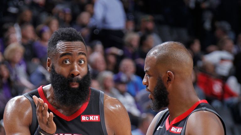 James Harden in animated discussion with team-mate Chris Paul