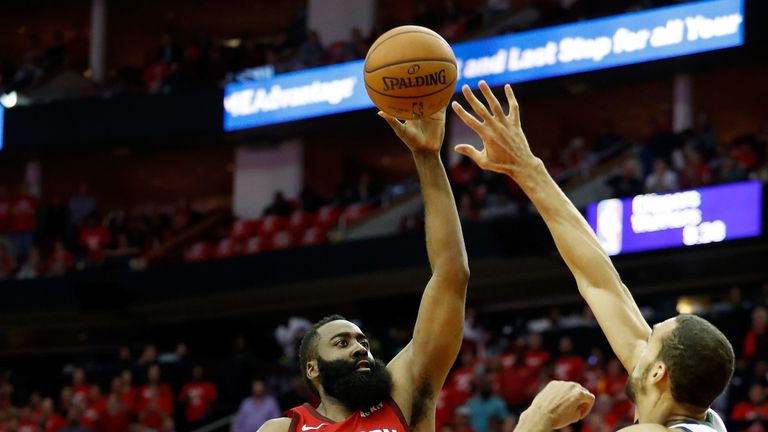James Harden lofts a floater over Rudy Gobert