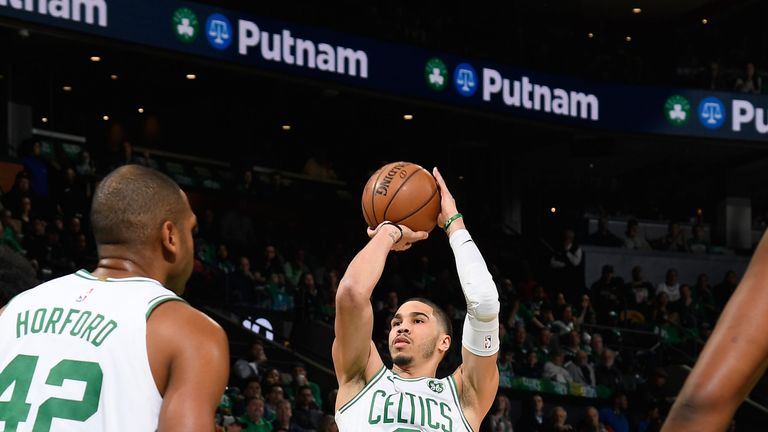 Jayson Tatum shoots a jump shot in Game 2 against the Pacers