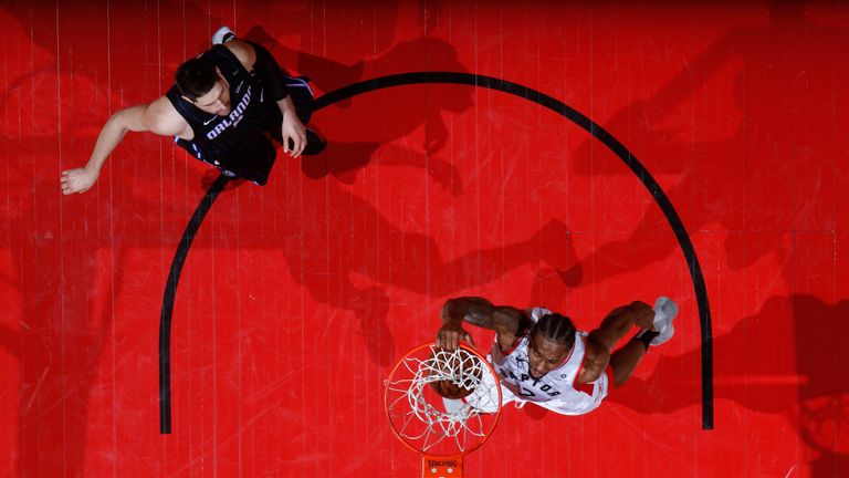 Kawhi Leonard rams home a dunk in Game 2 against the Orlando Magic