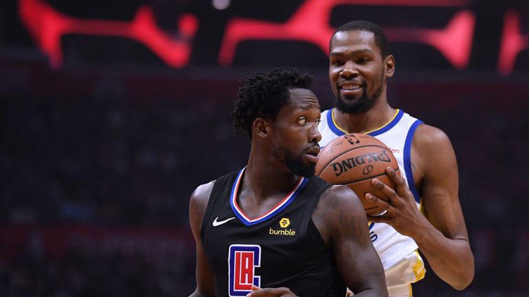 Kevin Durant smirks at a confused Patrick Beverley in the Warriors' Game 3 win over the Clippers