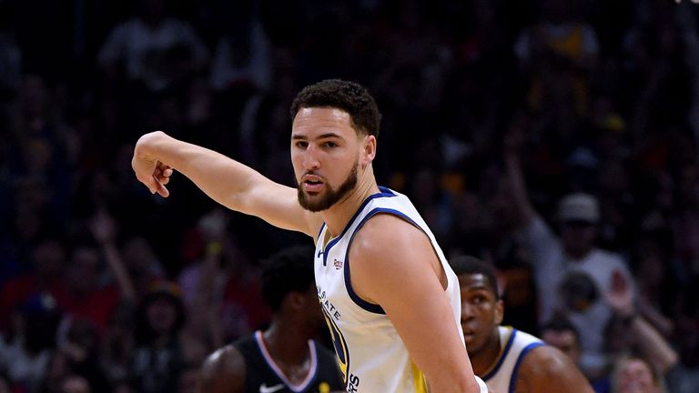 Klay Thompson celebrates en route to 27 first-half points against the Clippers in Game 3