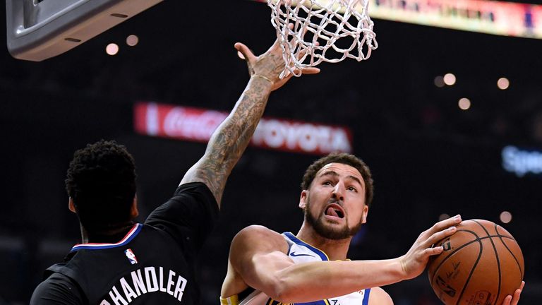 Klay Thompson attacks the rim en route to 32 points against the Clippers in Game 4