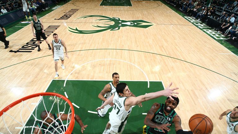 Kyrie Irving finishes over Ersan Ilyasova in the Celtics' Game 1 win