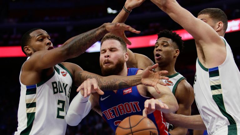 Blake Griffin is crowded out by a trio of Milwaukee Bucks defenders