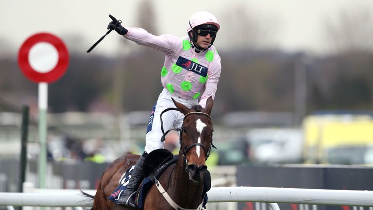 Ruby Walsh celebrates as Min wins at Aintree