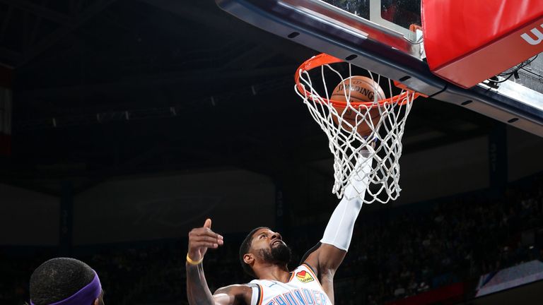 Paul George finishes a 360 slam against the Los Angeles Lakers