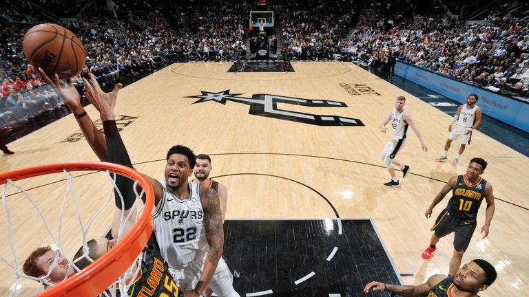 Rudy Gay finishes at the rim against Atlanta