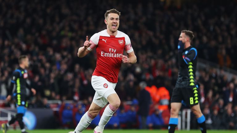 Aaron Ramsey celebrates opening the scoring for Arsenal against Napoli