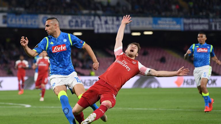 Aaron Ramsey clashes with Nikola Maksimovic of Napoli