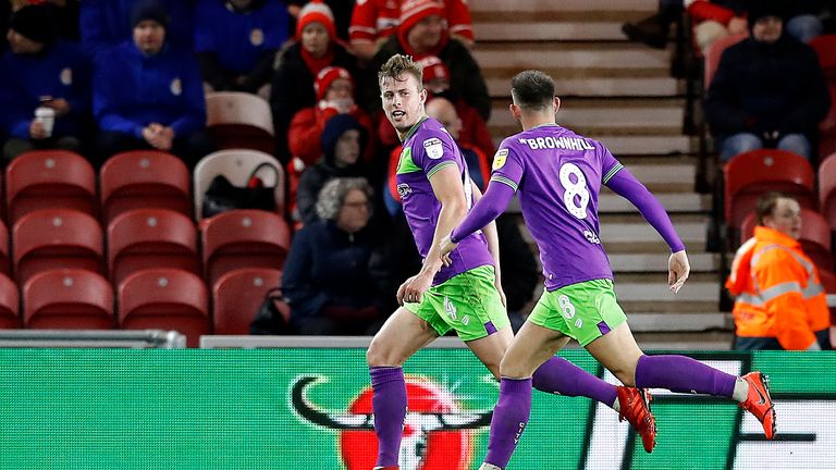 Bristol City's Adam Webster (left) celebrates scoring his teams first goal against Middlesbrough, during the Sky Bet Championship match at The riverside Stadium, Middlesbrough