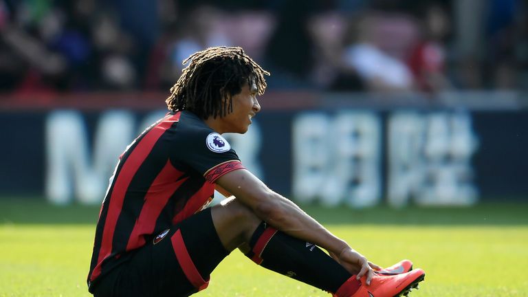 Bournemouth's Nathan Ake sits on the floor following their defeat to Fulham.