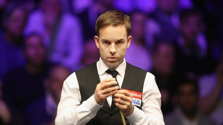 Ali Carter of England prepares to play a shot during his first round match against Shaun Murphy of England on day four of The Dafabet Masters at Alexandra Palace on January 17, 2018 in London, England