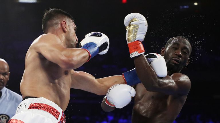 Amir Khan catches Terence Crawford with a left hook