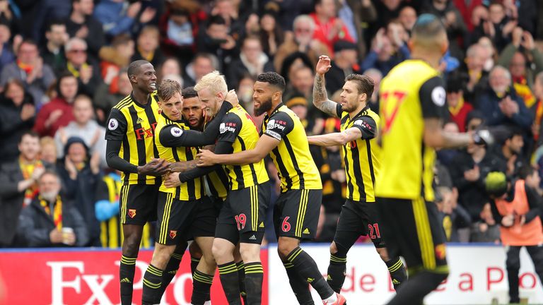 Andre Gray celebrates with team-mates after scoring Watford's equaliser