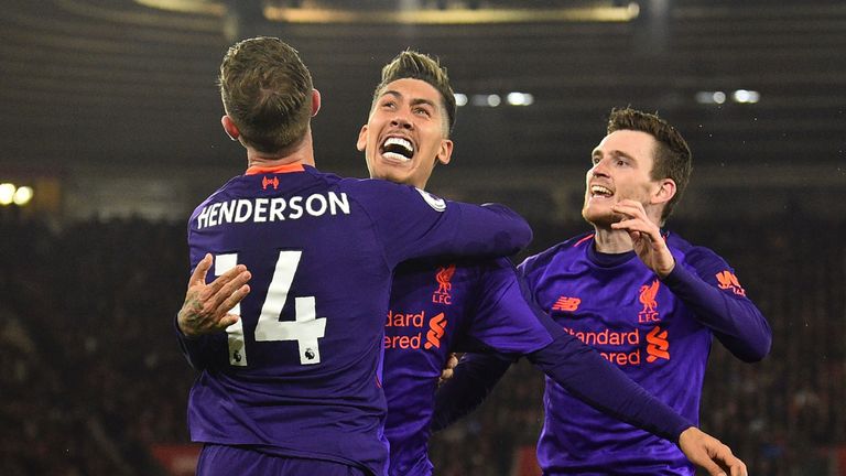 Andrew Robertson celebrates with his team-mates