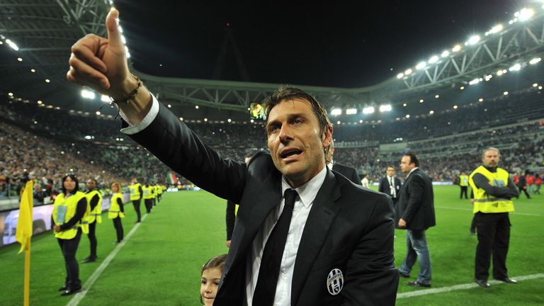 Juventus head coach Antonio Conte celebrates after beating Atalanta BC 1-0 to win the Serie A Championships at the end of the Serie A match between Juventus and Atalanta BC at Juventus Arena on May 5, 2014 in Turin, Italy.