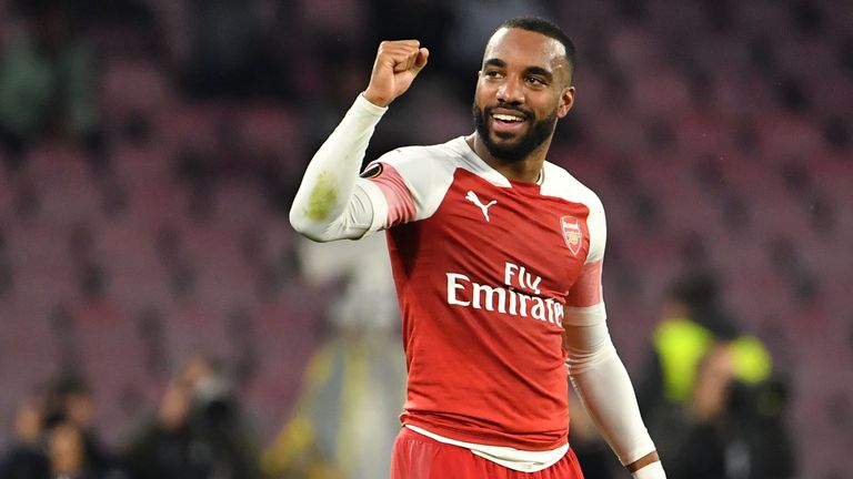 Arsenal's French striker Alexandre Lacazette celebrates after opening the scoring during the UEFA Europa League quarter-final second leg football match Napoli vs Arsenal on April 18, 2019 at the San Paolo stadium in Naples. (Photo by Andreas SOLARO / AFP) (Photo credit should read ANDREAS SOLARO/AFP/Getty Images)