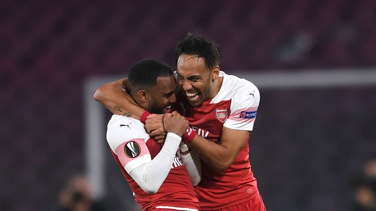 NAPLES, ITALY - APRIL 18: Alexandre Lacazette celebrates scoring a goal for Arsenal with Pierre-Emerick Aubameyang during the UEFA Europa League Quarter Final Second Leg match between S.S.C. Napoli and Arsenal at Stadio San Paolo on April 18, 2019 in Naples, Italy. (Photo by David Price/Arsenal FC via Getty Images)