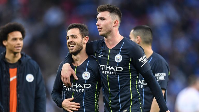 Aymeric Laporte and Bernardo Silva celebrate Man City's FA Cup semi-final win over Brighton