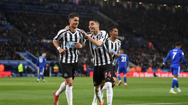 LEICESTER, ENGLAND - APRIL 12: Ayoze Perez of Newcastle United celebrates with teammate Miguel Almiron of Newcastle United after scoring his team's first goal during the Premier League match between Leicester City and Newcastle United at The King Power Stadium on April 12, 2019 in Leicester, United Kingdom. (Photo by Michael Regan/Getty Images)