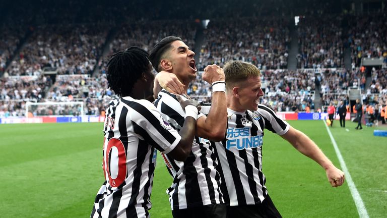Ayoze Perez celebrates with team-mates after completing his hat-trick