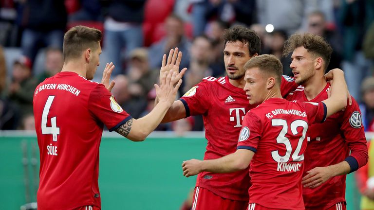 Niklas Suele, Mats Hummels, Joshua Kimmich and Leon Goretzka of Muenchen celebrate the firts goal during the DFB Cup match between FC Bayern Muenchen and 1. FC Heidenheim at Allianz Arena on April 03, 2019 in Munich, Germany