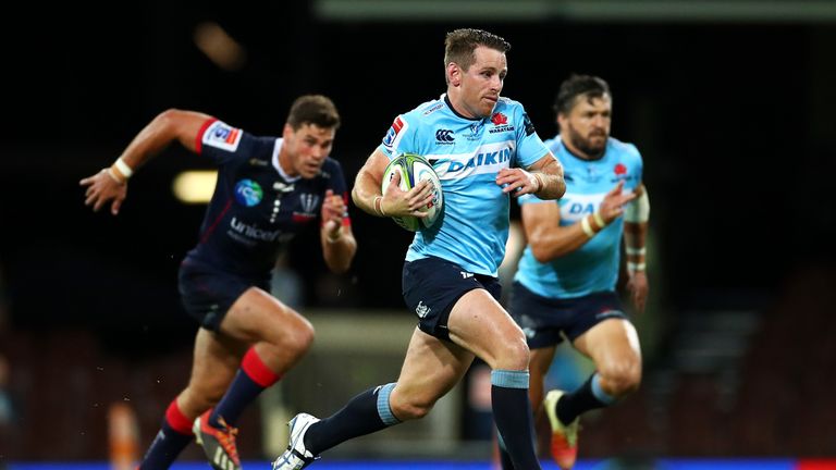 Bernard Foley makes a break for the Waratahs